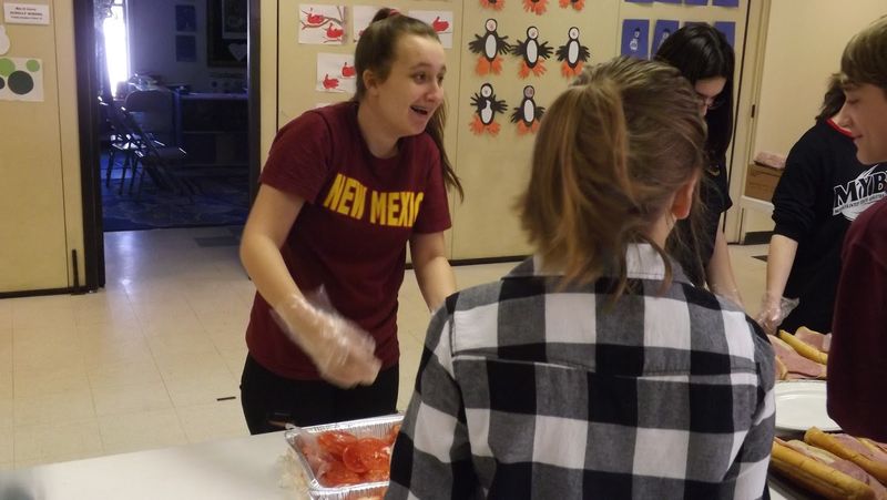 Confirmation class making hoagies (2 of 2)